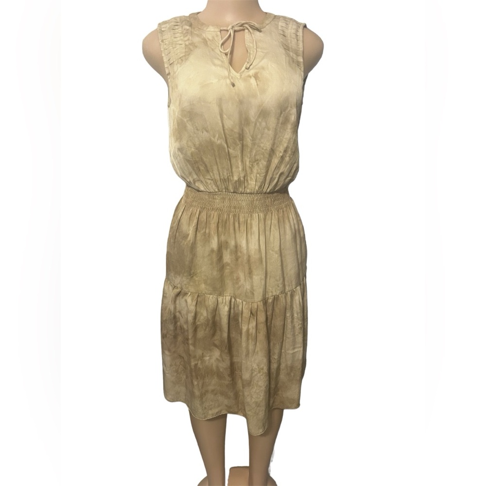 Beautiful dress! By Madison Grey in a size XS. Color cream and tan